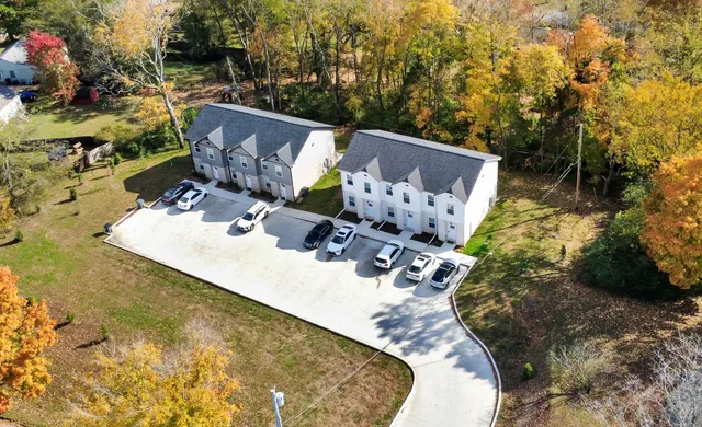 a car parked in front of a house