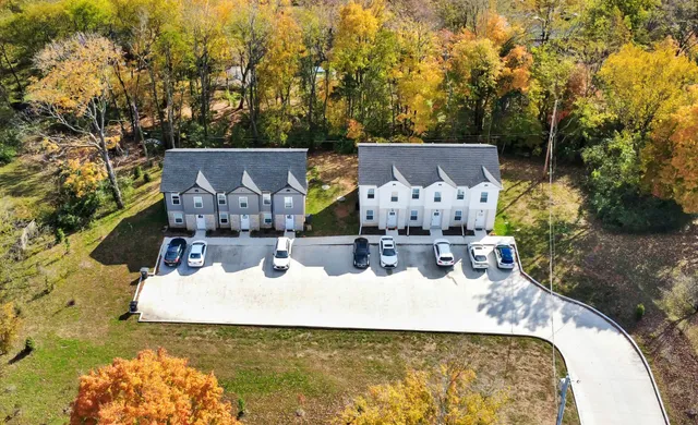 a view of a street with cars