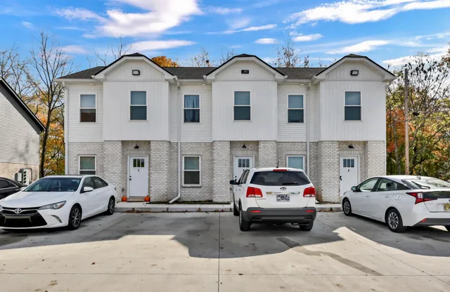 a view of a car park in front of a building