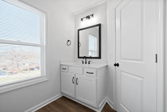 a view of a room with racks on the wall