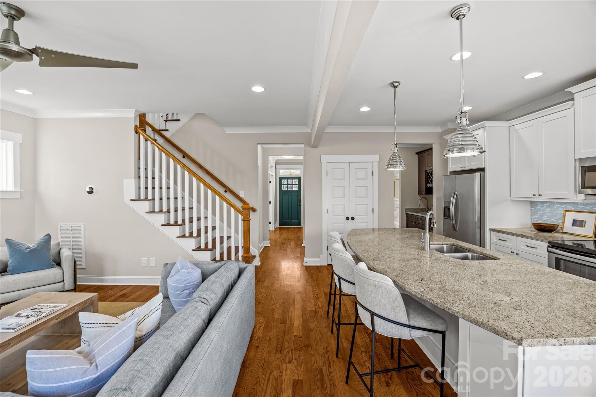 1728 Burgin Street Charlotte, NC 28205 - Photo 12 of 43 a kitchen with counter top space a sink and appliances
