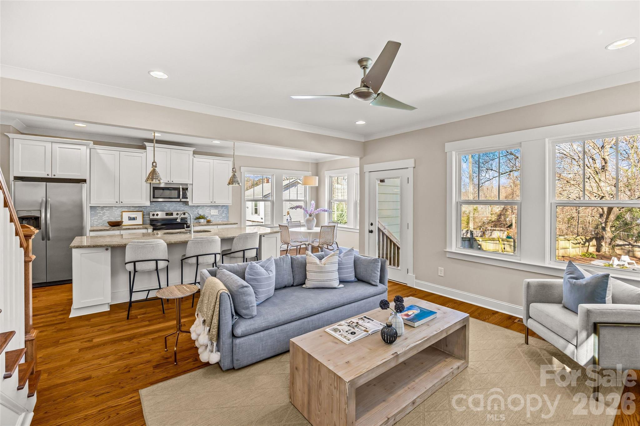 1728 Burgin Street Charlotte, NC 28205 - Photo 19 of 43 a living room with furniture and a large window