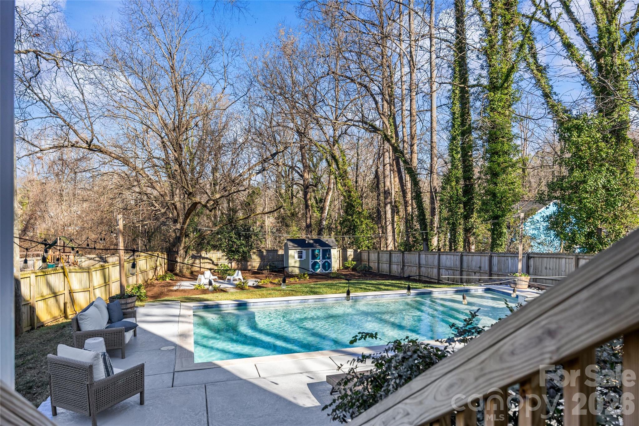 1728 Burgin Street Charlotte, NC 28205 - Photo 32 of 43 a view of a swimming pool with a patio