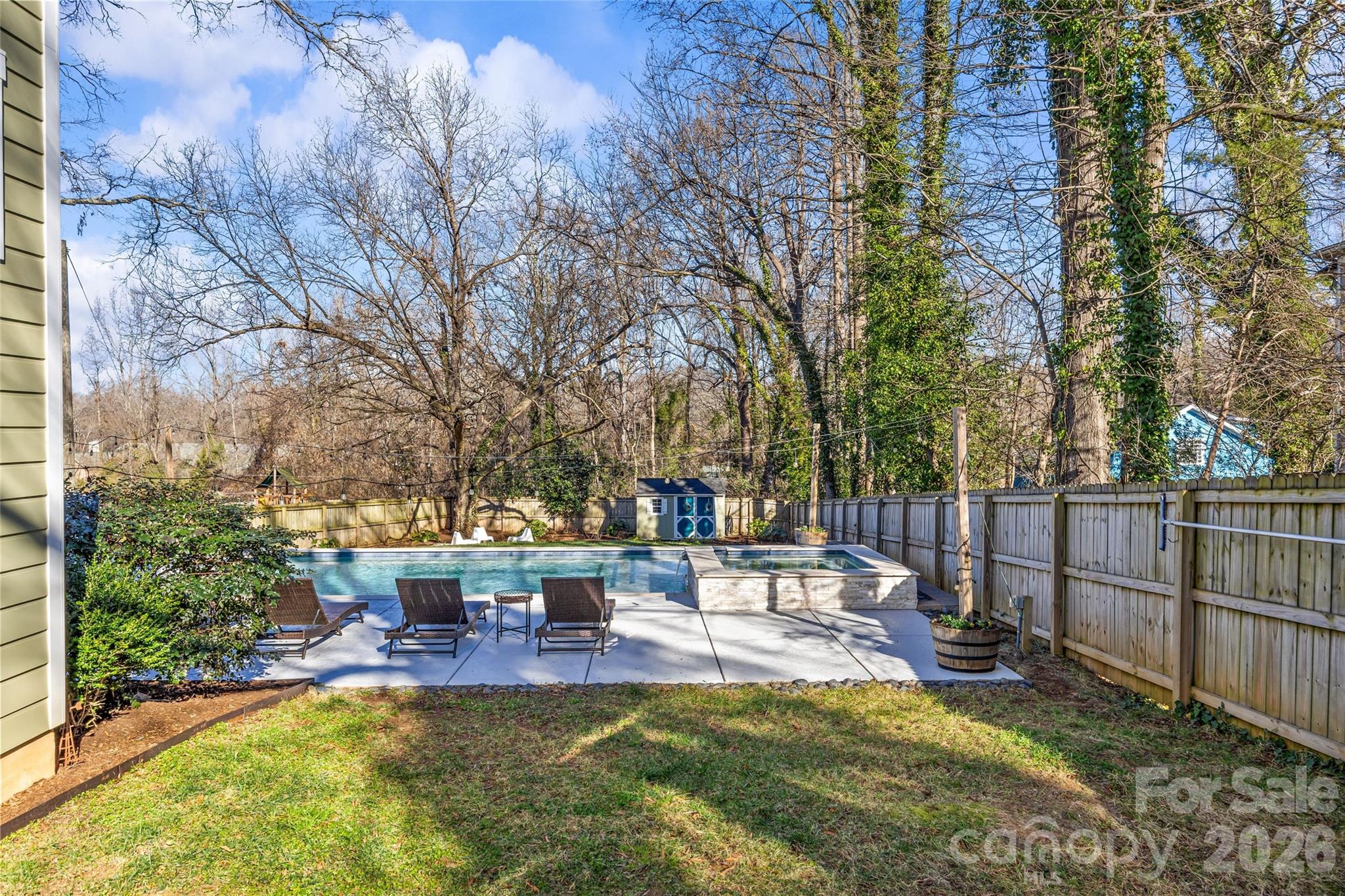 1728 Burgin Street Charlotte, NC 28205 - Photo 35 of 43 a view of a swimming pool with chairs