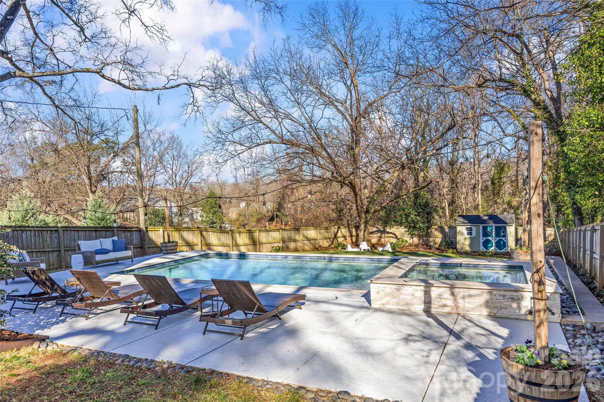 1728 Burgin Street Charlotte, NC 28205 - Photo 36 of 43 a view of a swimming pool with a patio