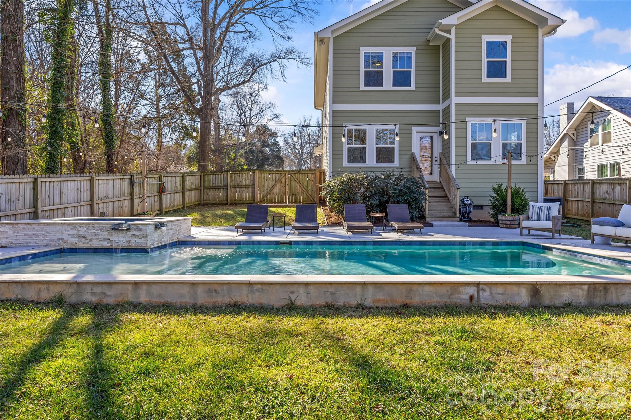 1728 Burgin Street Charlotte, NC 28205 - Photo 37 of 43 a view of a house with a yard and a large tree