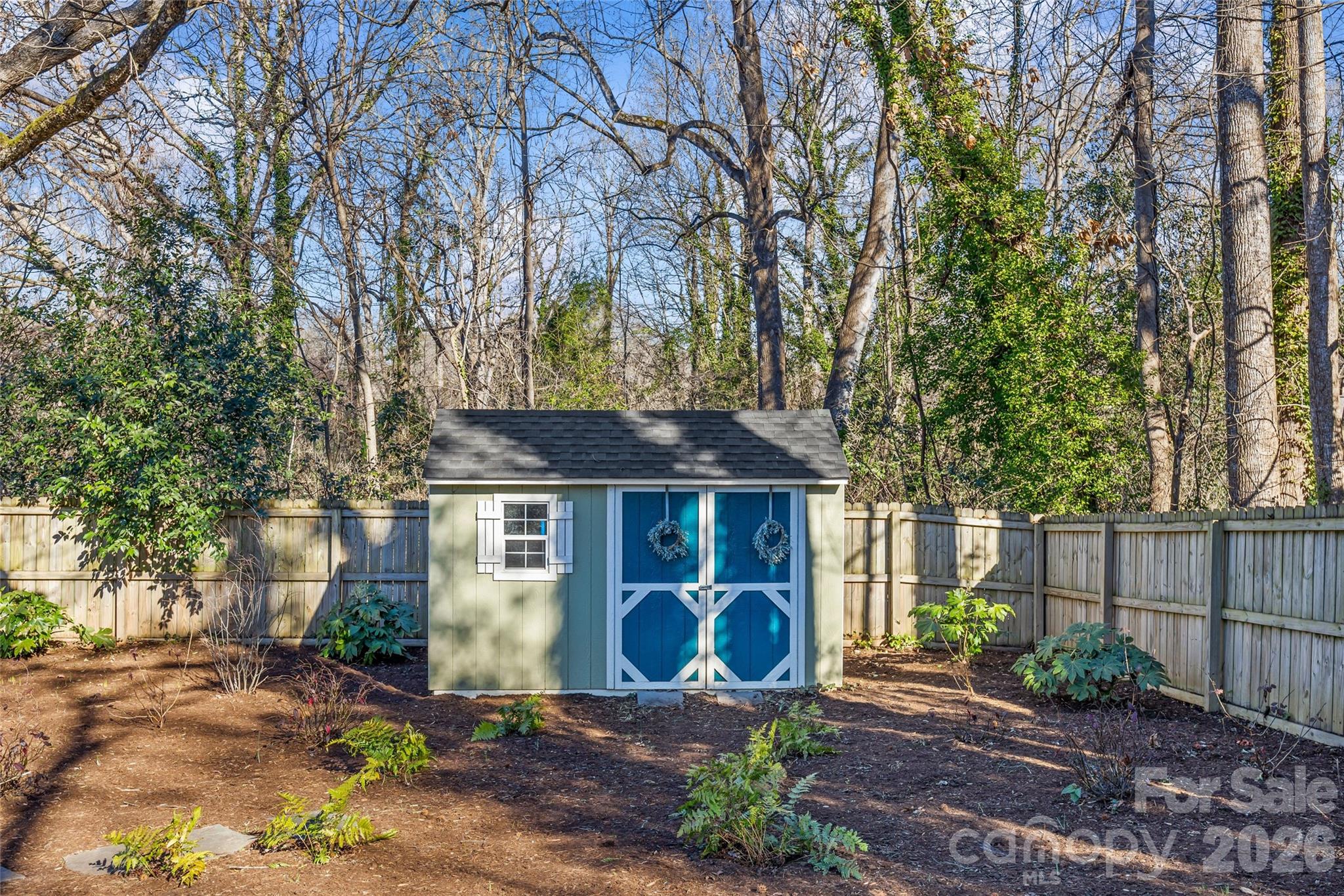 1728 Burgin Street Charlotte, NC 28205 - Photo 40 of 43 a front view of a house with garden