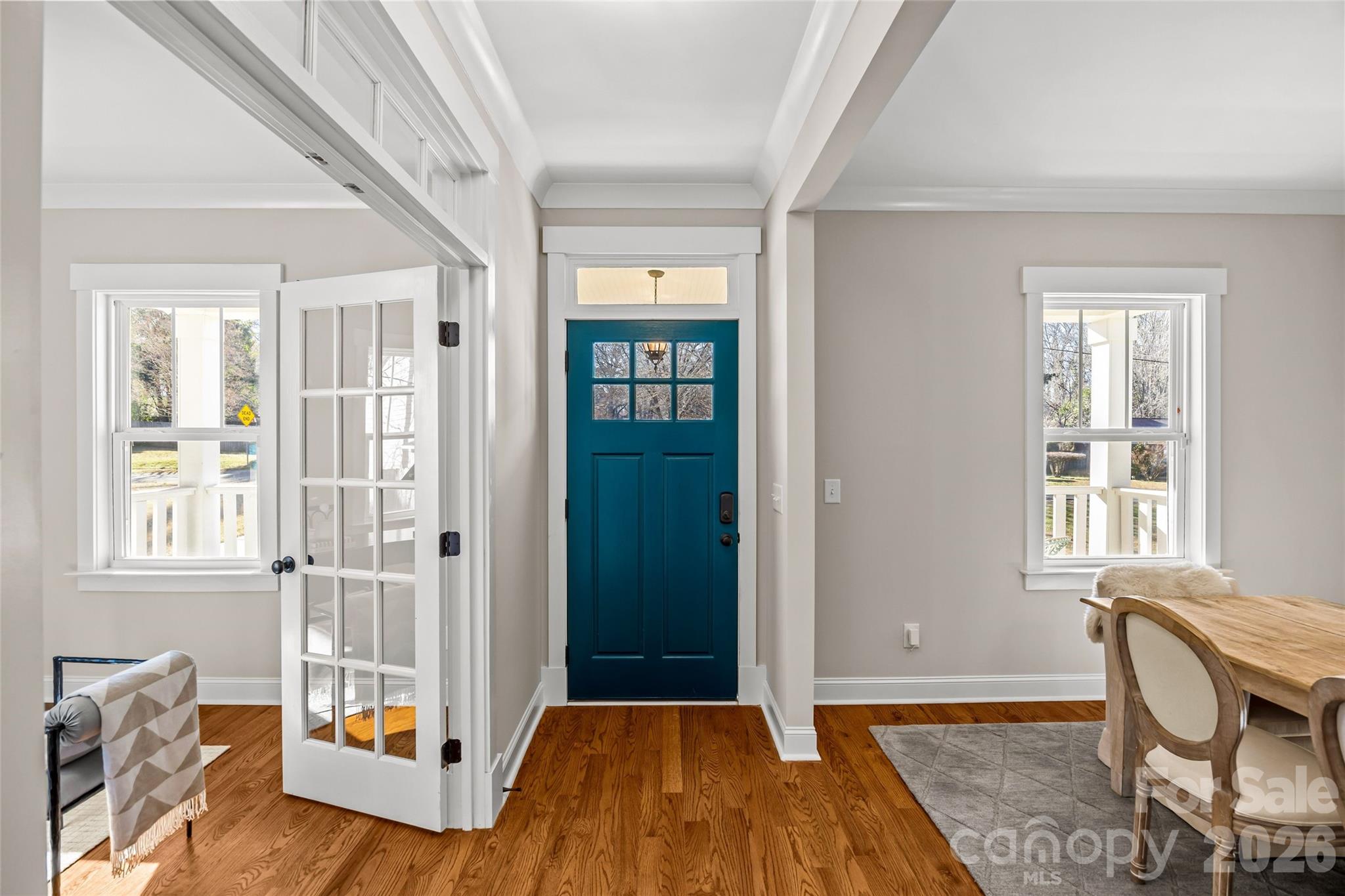 1728 Burgin Street Charlotte, NC 28205 - Photo 5 of 43 a bedroom with a bed and wooden floor