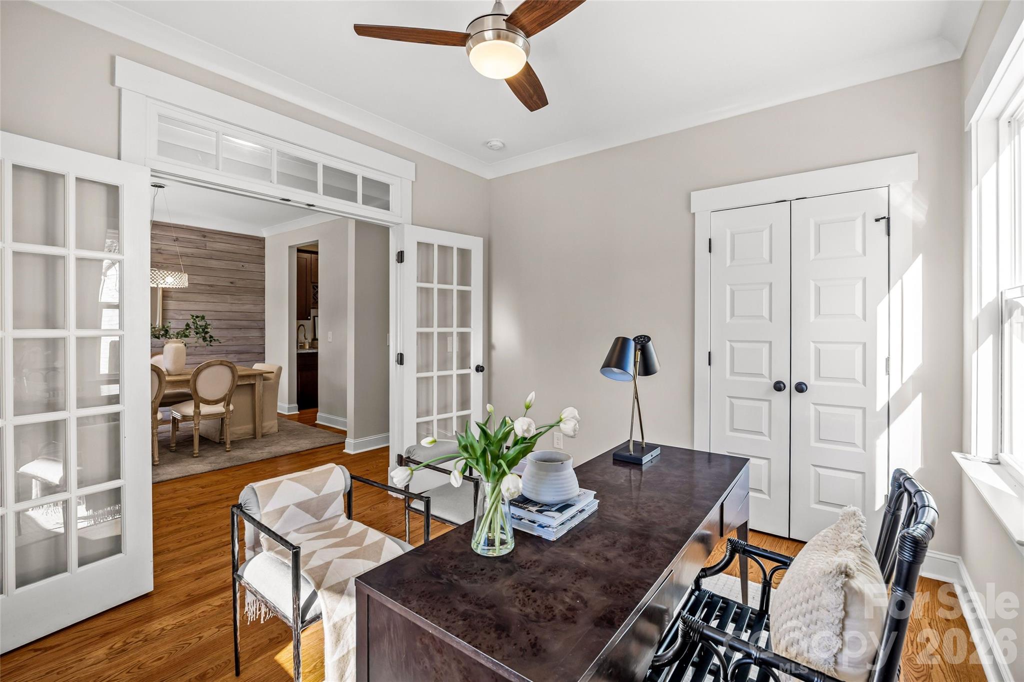 1728 Burgin Street Charlotte, NC 28205 - Photo 9 of 43 a view of a dining room with furniture and wooden floor