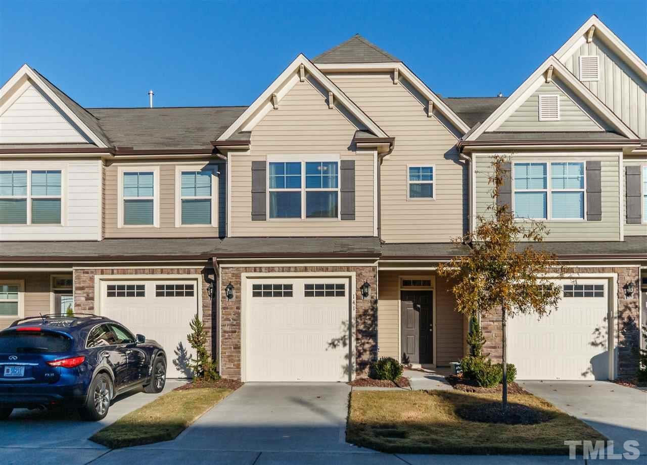 141 Token House Road Durham, NC 27703 - Photo 1 of 22 Attractive stone vinyl front exterior with one car garage.