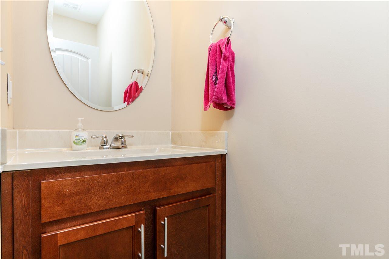 141 Token House Road Durham, NC 27703 - Photo 12 of 22 Beautiful cabinetry and elegant mirror.