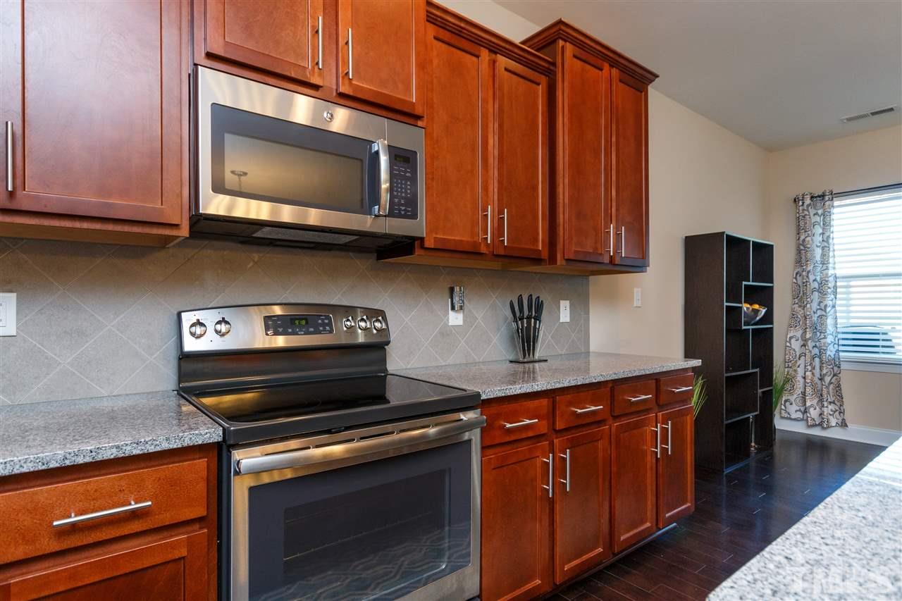 141 Token House Road Durham, NC 27703 - Photo 6 of 22 Beautiful Cabinets with plenty of storage space.