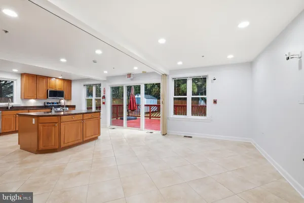 a view of a kitchen with wooden floor
