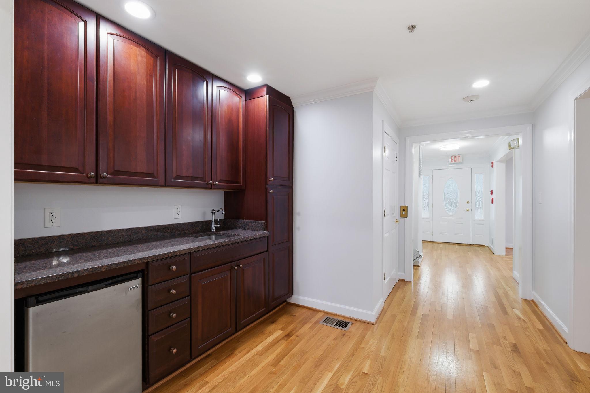 711 Lamberton Drive Silver Spring, MD 20902 - Photo 21 of 60 a view of a kitchen with wooden floor