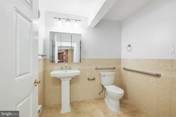 a view of a livingroom with wooden floor and fireplace