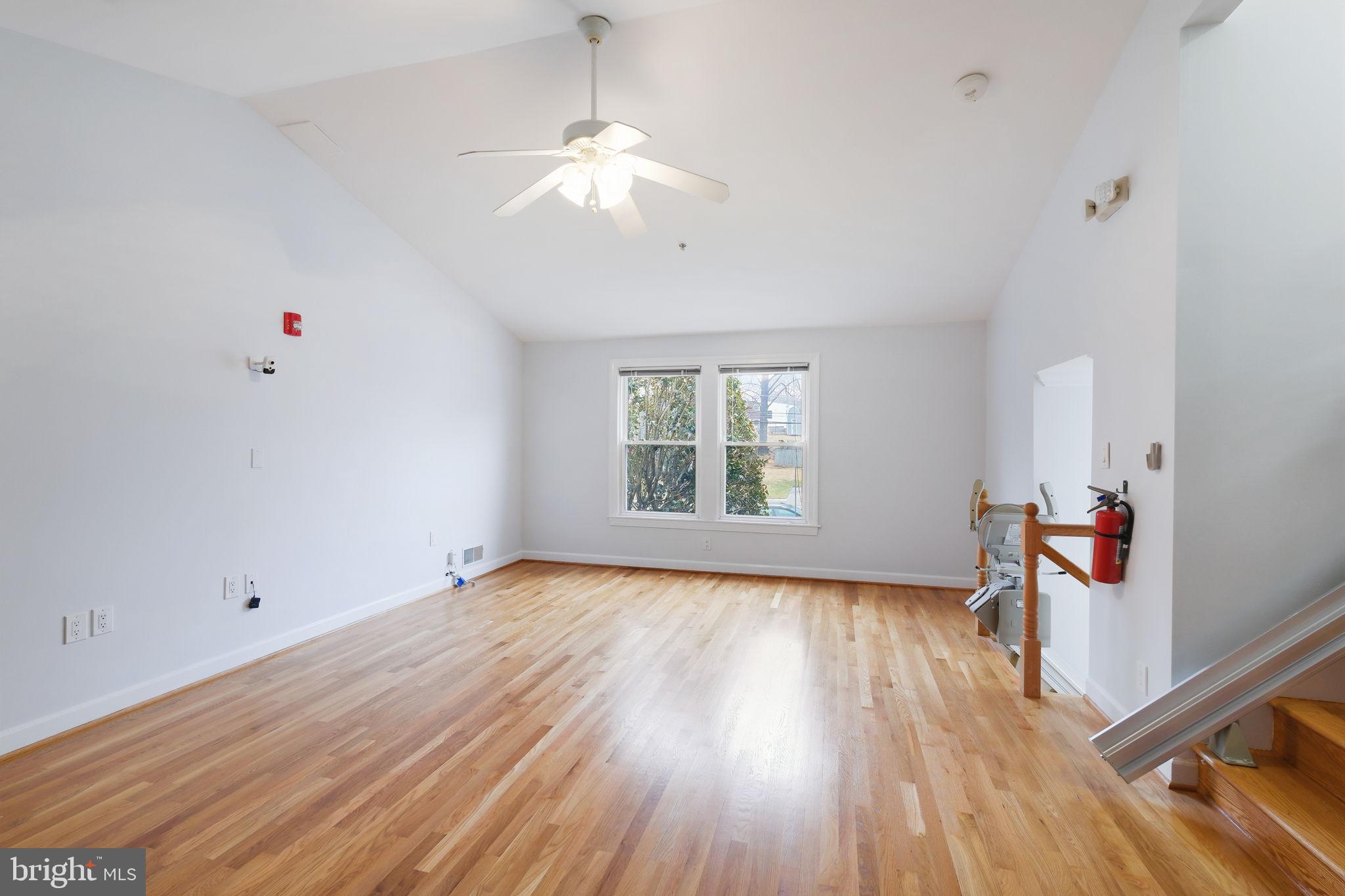 711 Lamberton Drive Silver Spring, MD 20902 - Photo 28 of 60 wooden floor in an empty room with a window