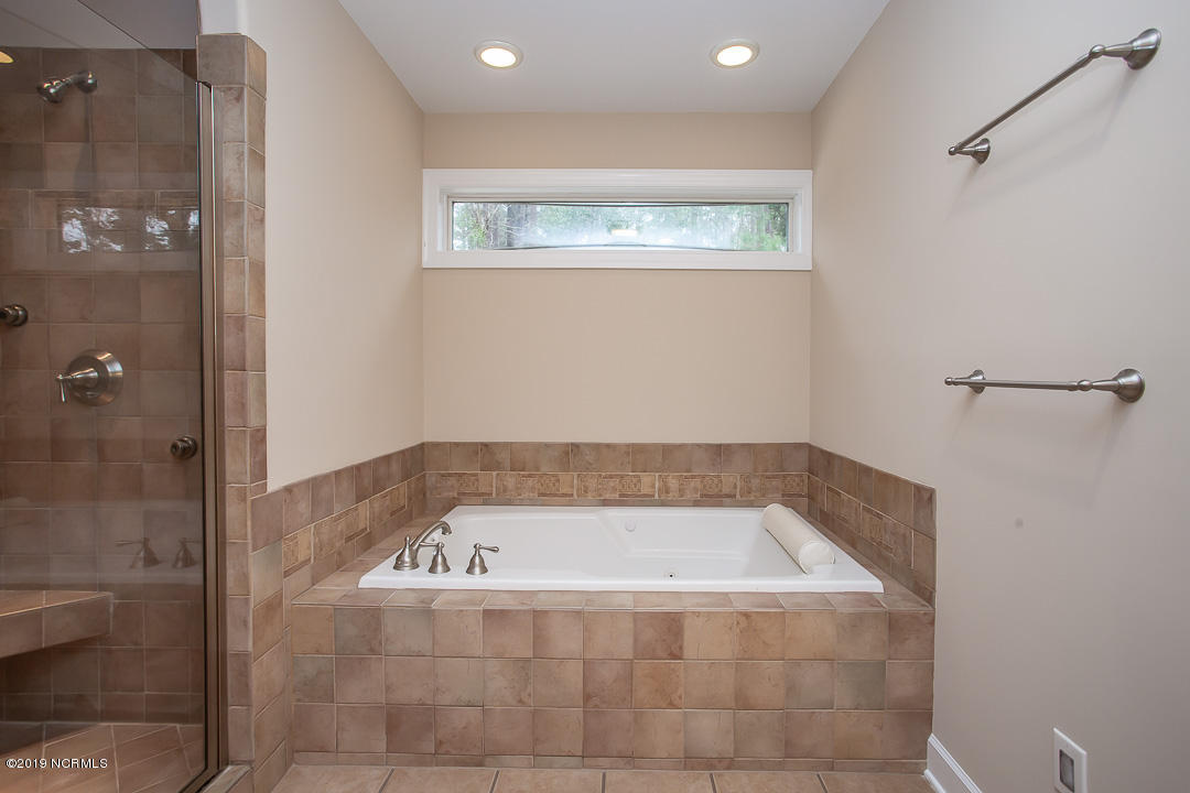 69 Persimmon Road Southwest Carolina Shores, NC 28467 - Photo 19 of 40 M bath jetted tub & shower