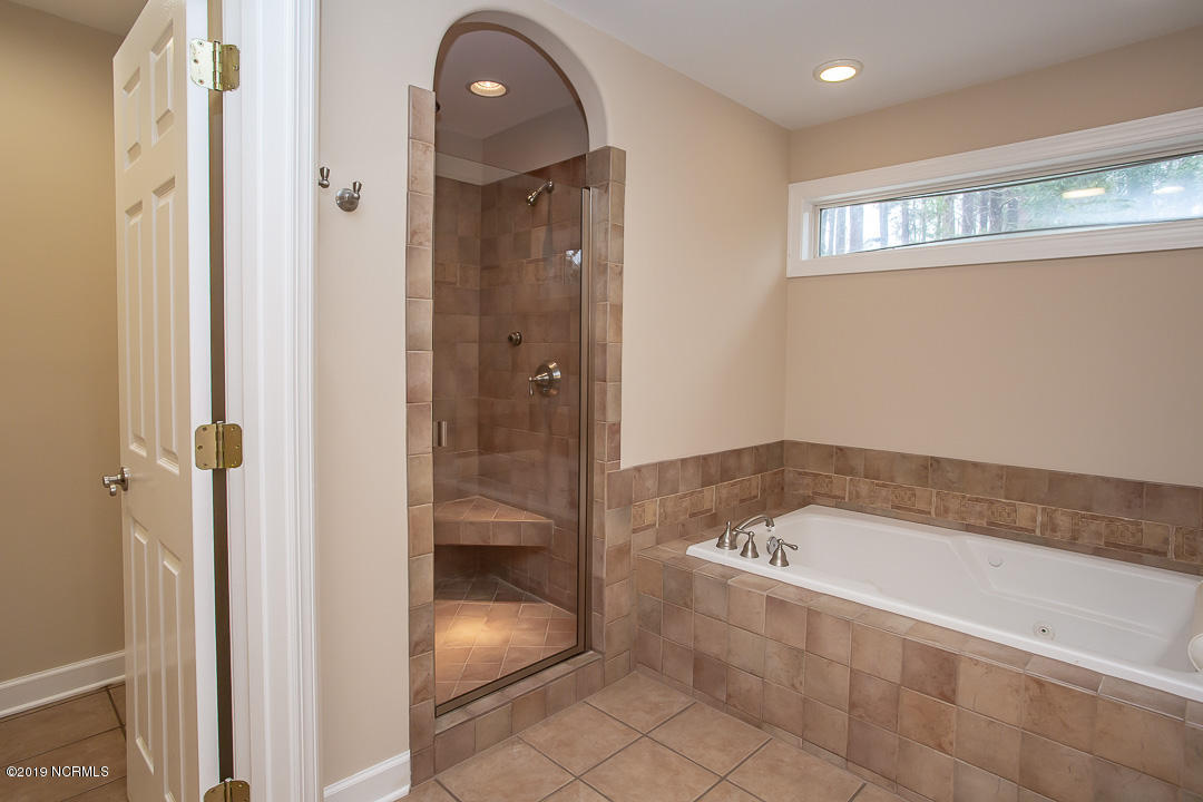 69 Persimmon Road Southwest Carolina Shores, NC 28467 - Photo 20 of 40 mbr tiled walk in shower