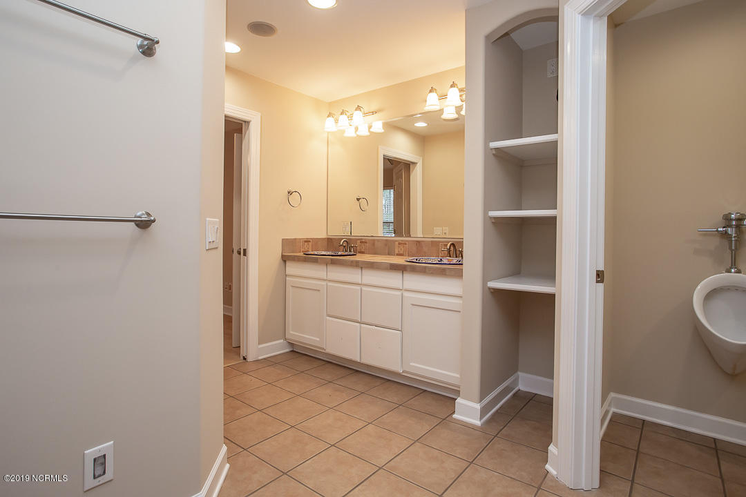 69 Persimmon Road Southwest Carolina Shores, NC 28467 - Photo 21 of 40 M Bath storage