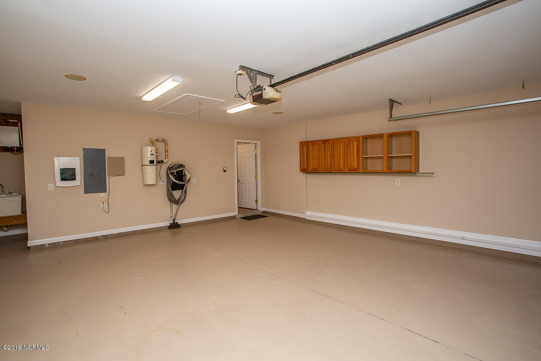 69 Persimmon Road Southwest Carolina Shores, NC 28467 - Photo 32 of 40 GARAGE