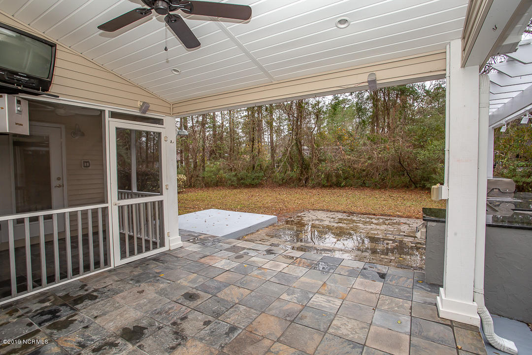 69 Persimmon Road Southwest Carolina Shores, NC 28467 - Photo 34 of 40 COVERED PATIO