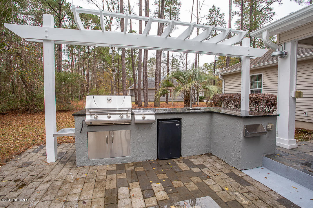 69 Persimmon Road Southwest Carolina Shores, NC 28467 - Photo 36 of 40 OUTDOOR KITCHEN