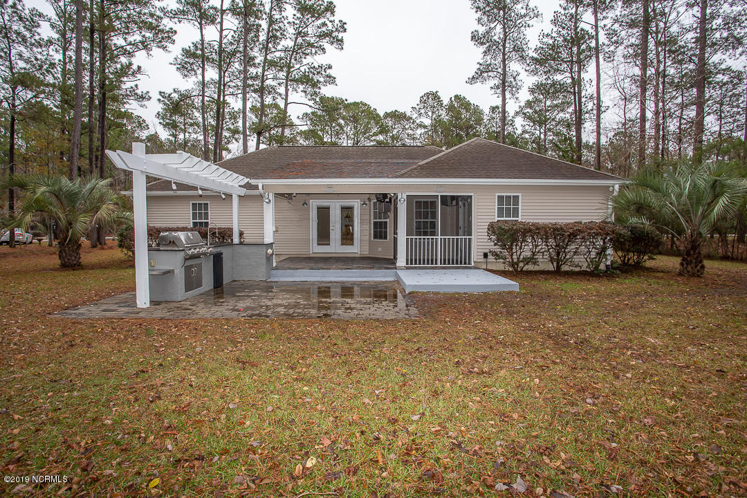 69 Persimmon Road Southwest Carolina Shores, NC 28467 - Photo 38 of 40 BACK YARD VIEW
