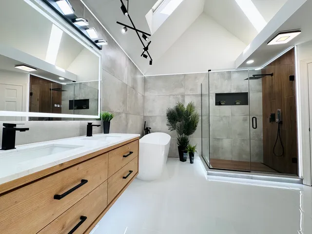 a bathroom with a bathtub and a shower