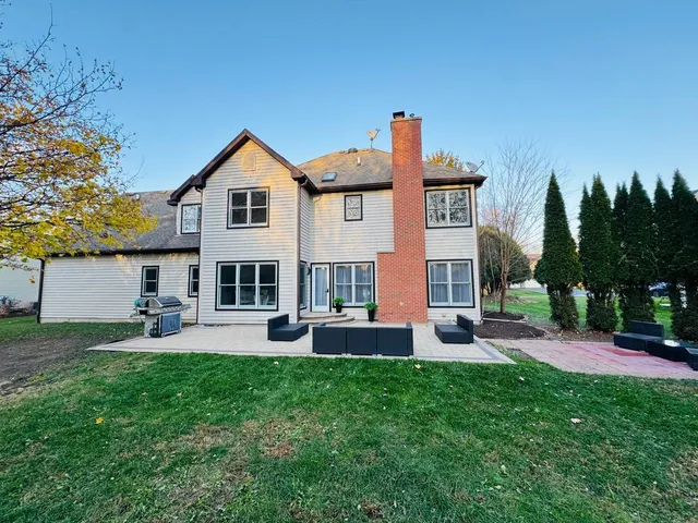 a view of a yard with furniture