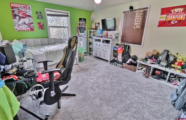 a view of a workspace with a couch