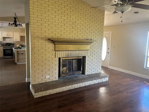 a living room with a fireplace
