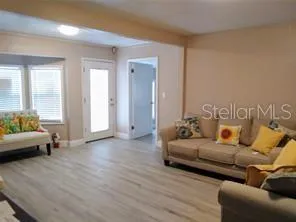 a living room with furniture and a couch