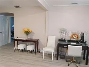 a view of a workspace with furniture