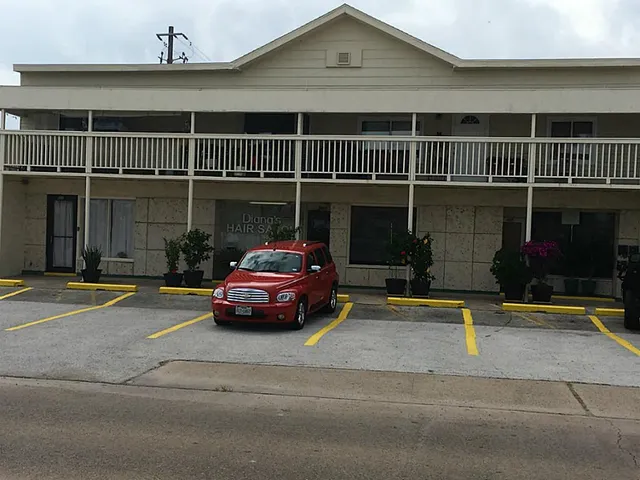 a car parked in front of a house