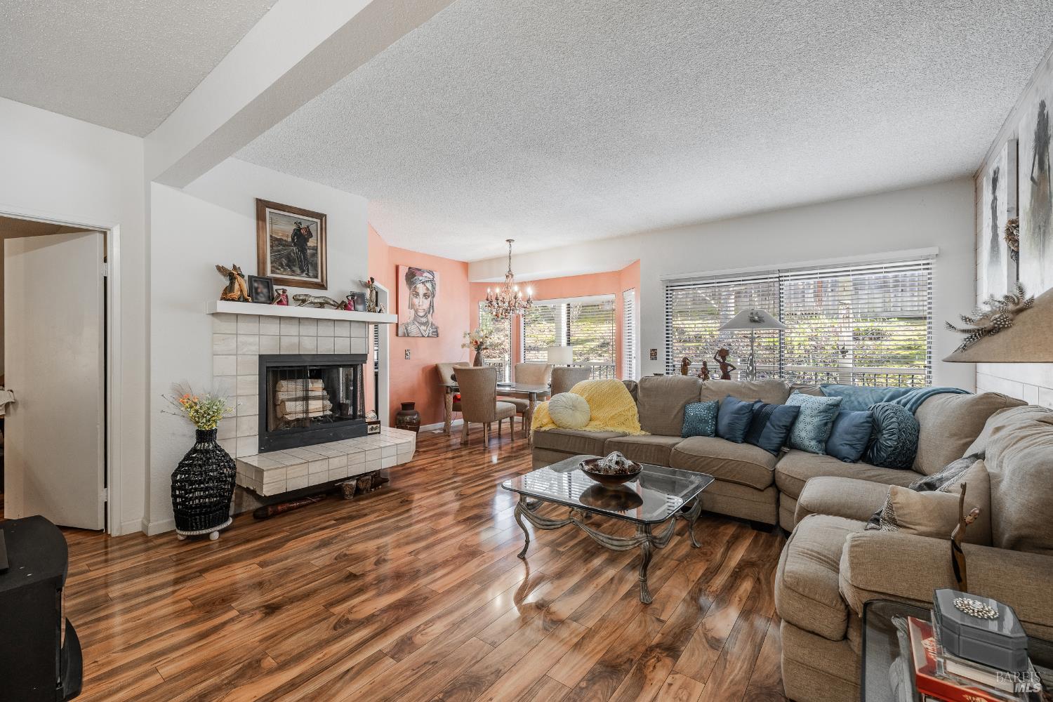 2454 Sebastopol Lane Hayward, CA 94542 - Photo 11 of 35 a living room with furniture or couch and a fireplace