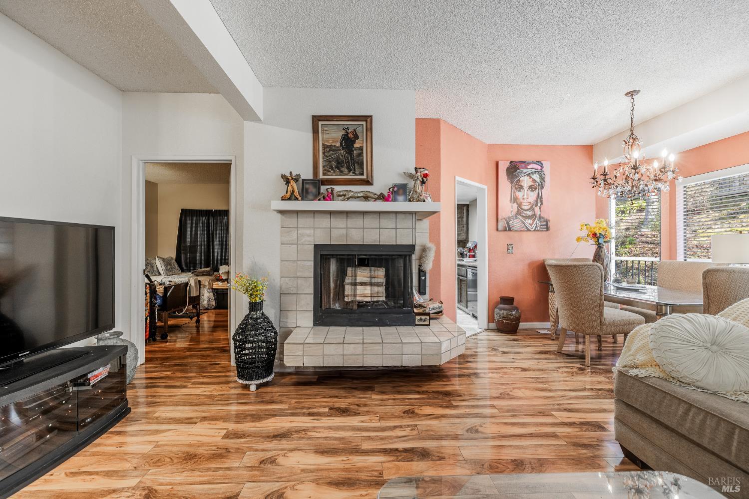 2454 Sebastopol Lane Hayward, CA 94542 - Photo 13 of 35 a living room with furniture and a fireplace or television