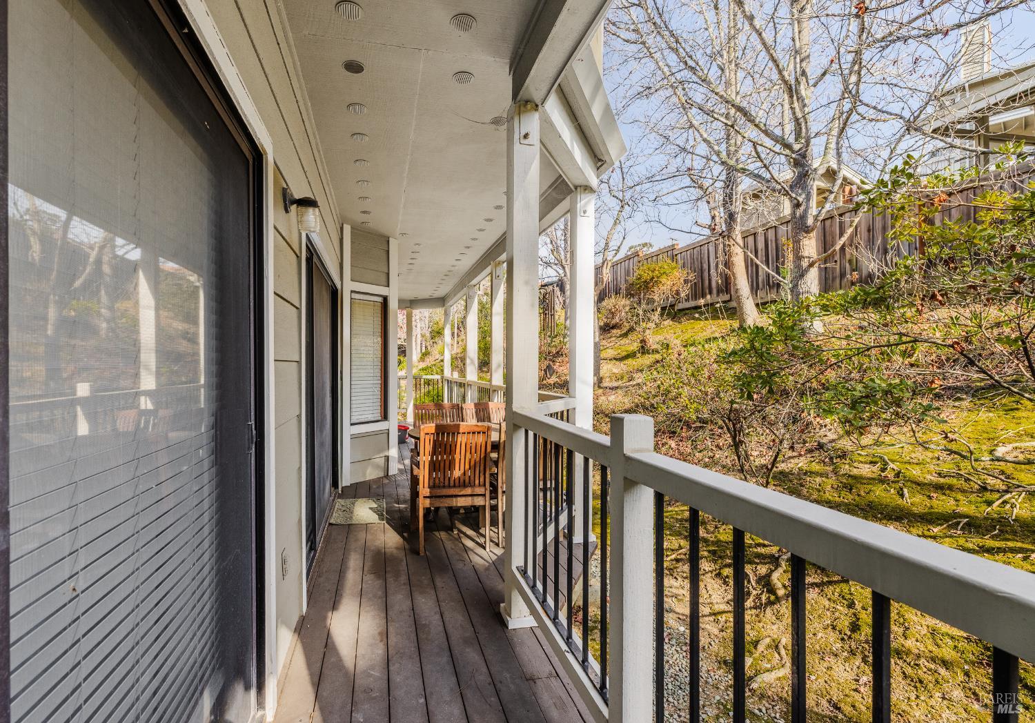 2454 Sebastopol Lane Hayward, CA 94542 - Photo 27 of 35 a view of a balcony with wooden floor and iron stairs
