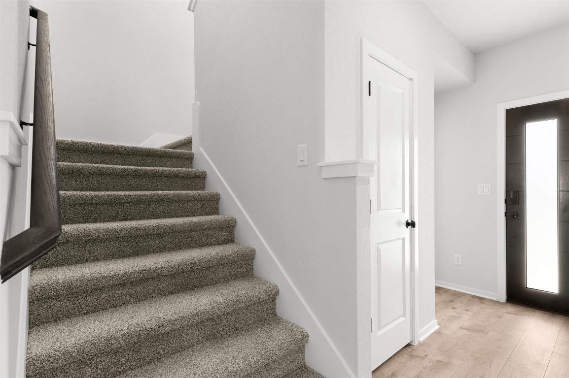 101 Coyote Willow Way Georgetown, TX 78633 - Photo 9 of 34 a view of entryway with wooden floor