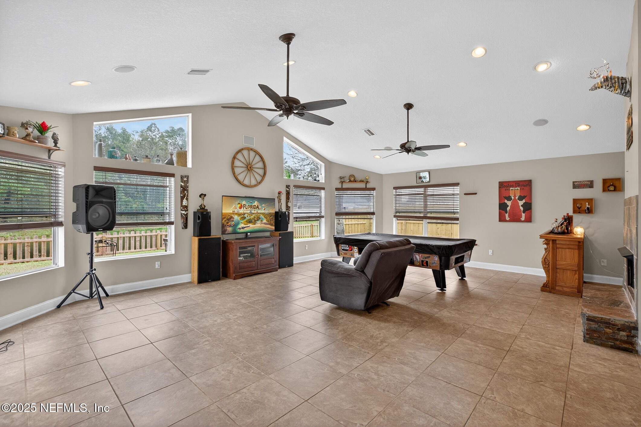 701 Camp Francis Johnson Road Orange Park, FL 32065 - Photo 18 of 64 a living room with furniture and a clock