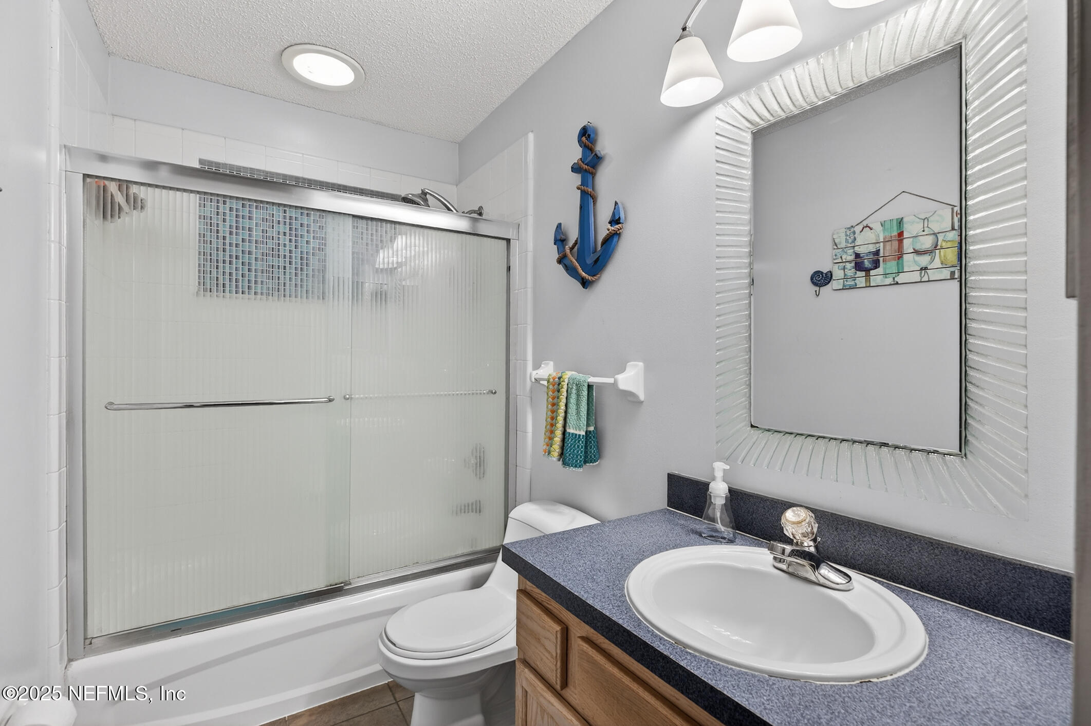 701 Camp Francis Johnson Road Orange Park, FL 32065 - Photo 37 of 64 a bathroom with a sink toilet and shower