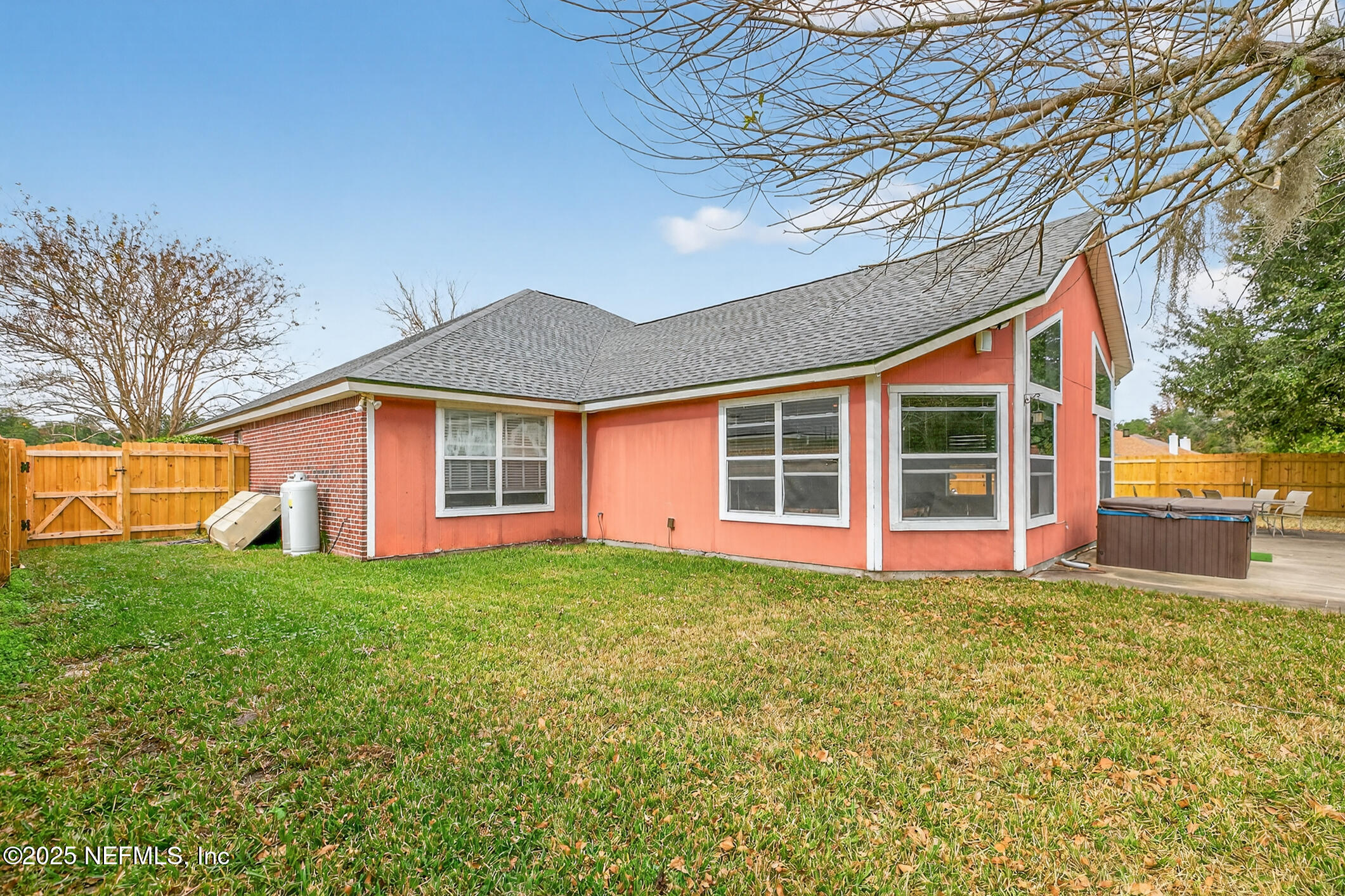 701 Camp Francis Johnson Road Orange Park, FL 32065 - Photo 53 of 64 a front view of a house with a yard