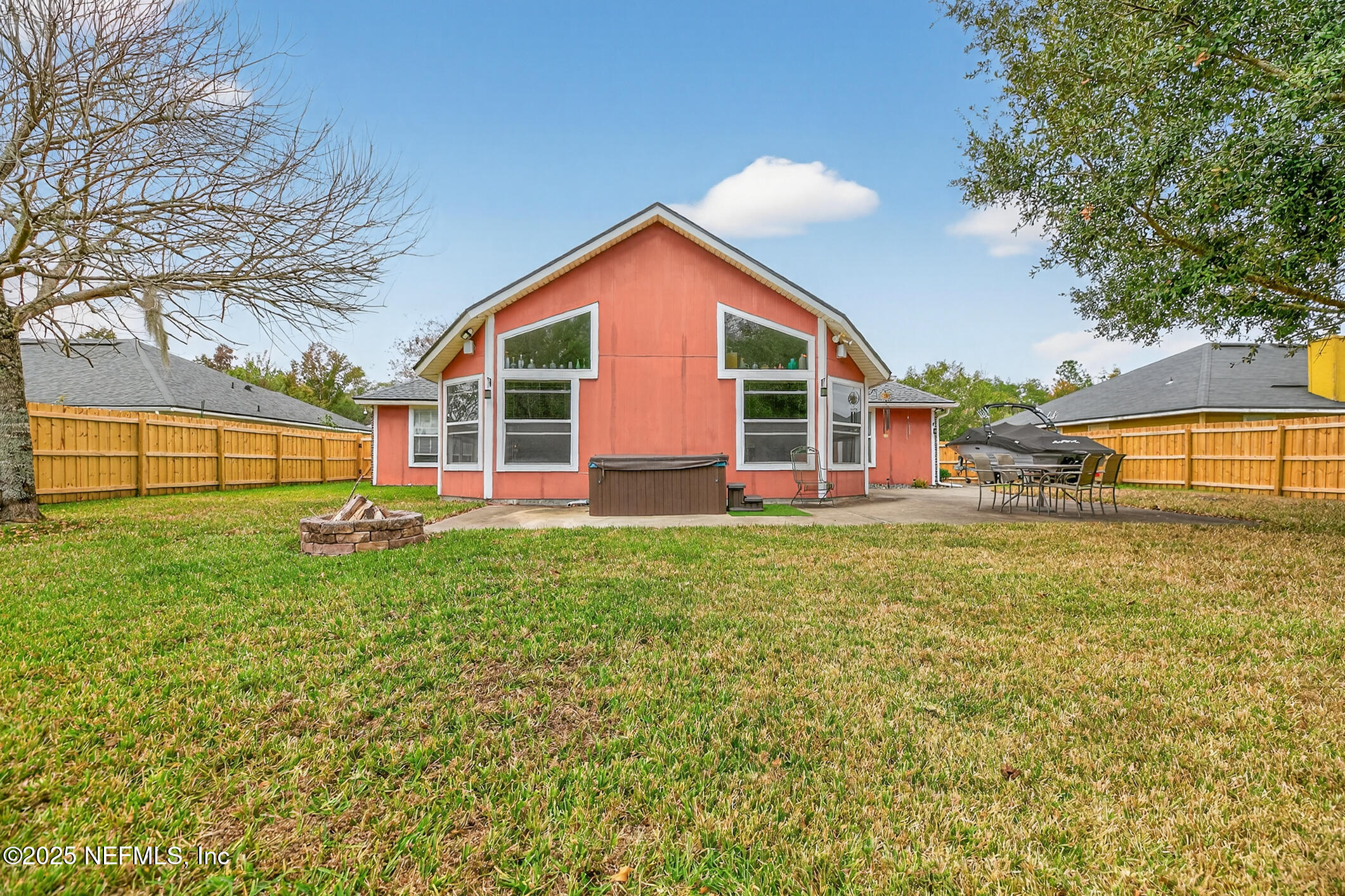 701 Camp Francis Johnson Road Orange Park, FL 32065 - Photo 61 of 64 a view of a house with backyard