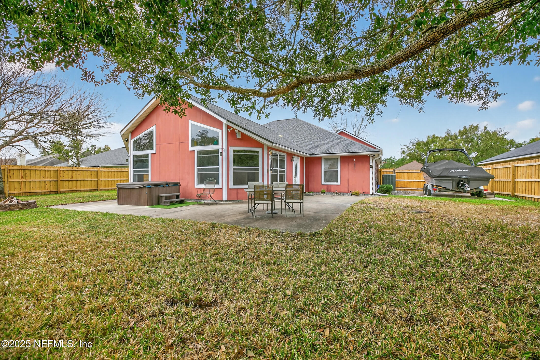 701 Camp Francis Johnson Road Orange Park, FL 32065 - Photo 63 of 64 a front view of a house with a yard