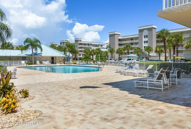 a view of an outdoor space and tennis court