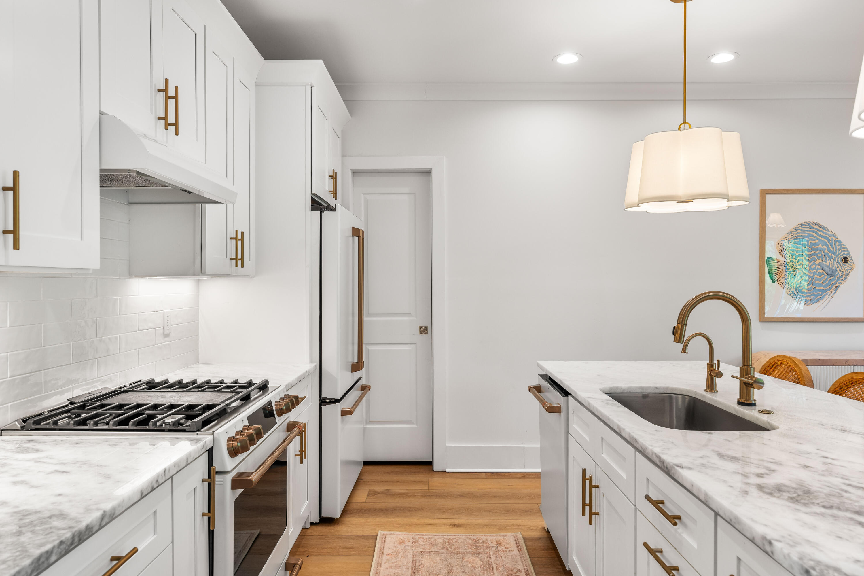 15 Sugar Sands Drive Santa Rosa Beach, FL 32459 - Photo 12 of 46 a kitchen with stainless steel appliances a sink a stove and a refrigerator