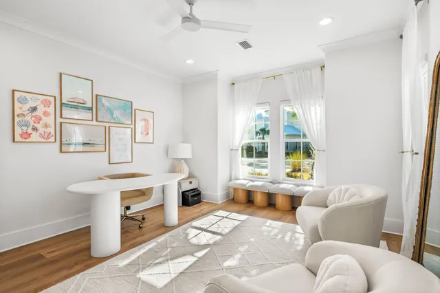 a spacious bedroom with a bed and a couch