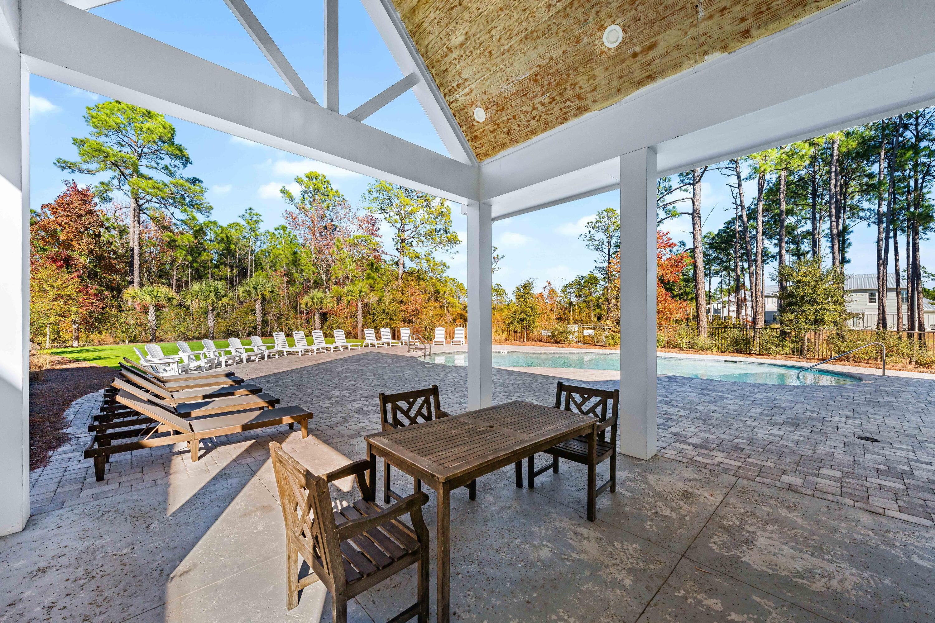 15 Sugar Sands Drive Santa Rosa Beach, FL 32459 - Photo 36 of 46 a view of an outdoor sitting area with furniture
