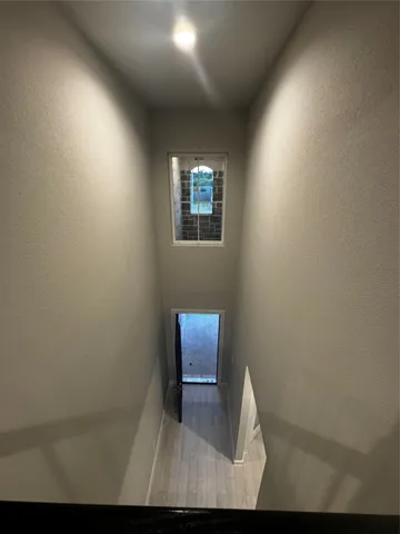 a bathroom with a double vanity sink a toilet and a mirror