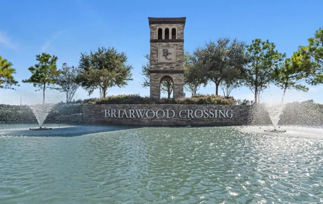 a view of a house with swimming pool yard and sitting area