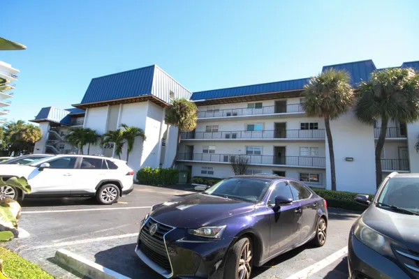 a view of car parked in front of house